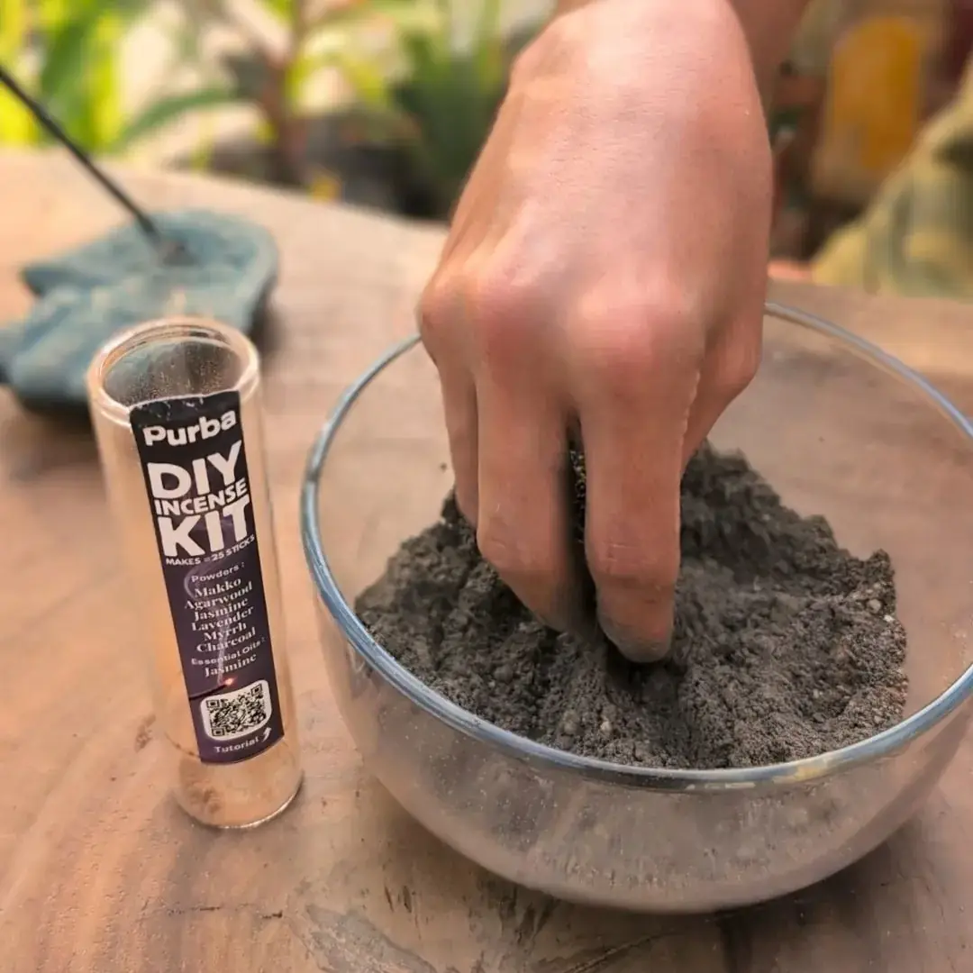 Mixing Purba incense powder beside the DIY kit
