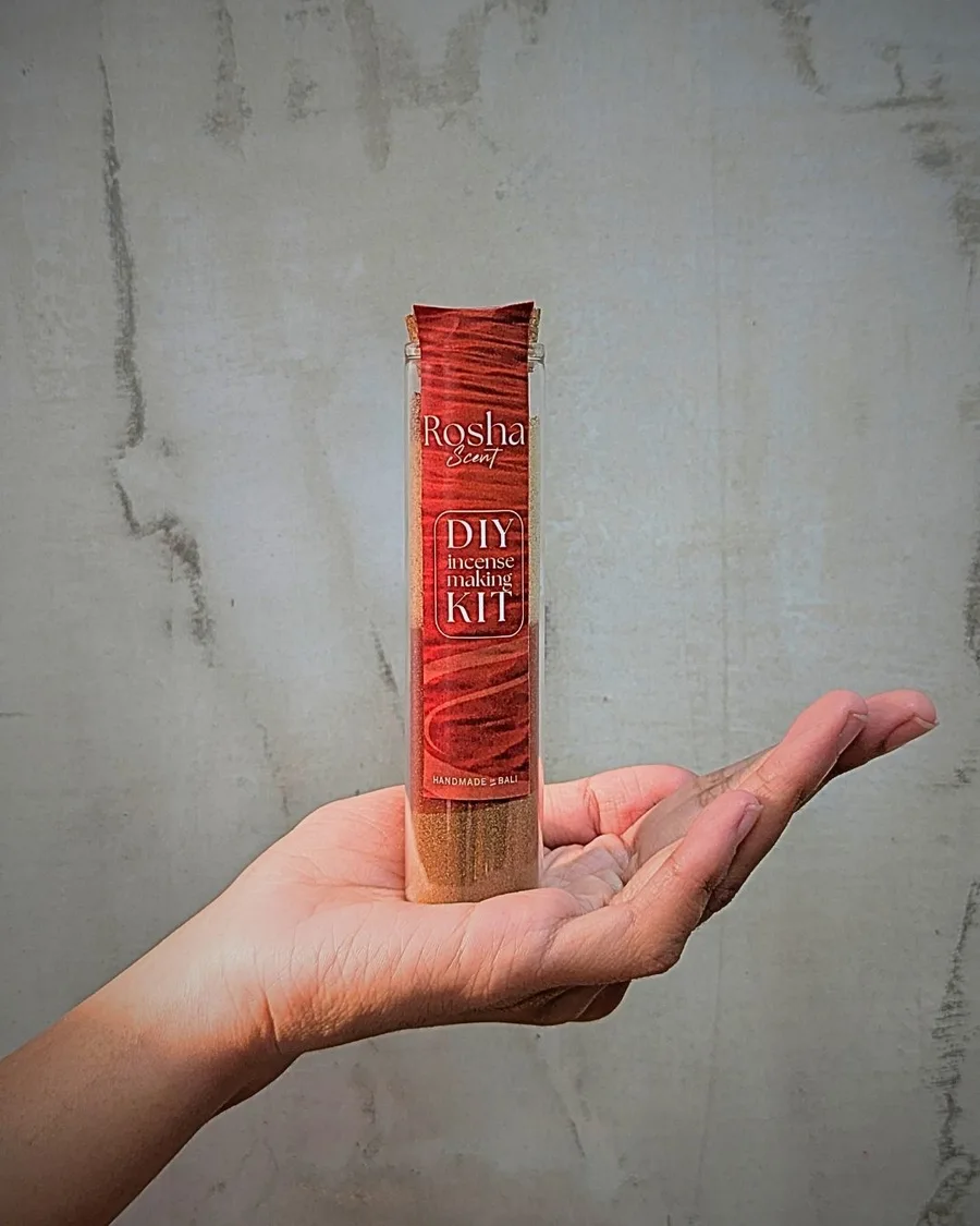 Rosha incense ingredients in a clear glass bottle