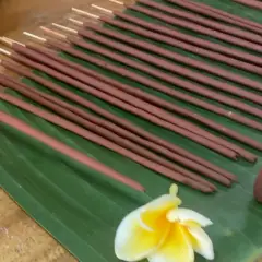 Handmade incense sticks laid out to air-dry