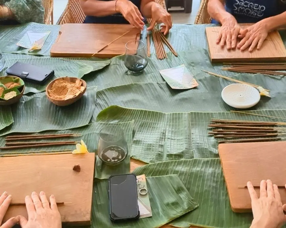 Guests making incense together at a retreat